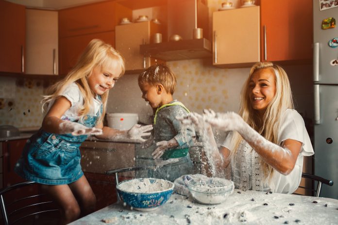 mother and children playing